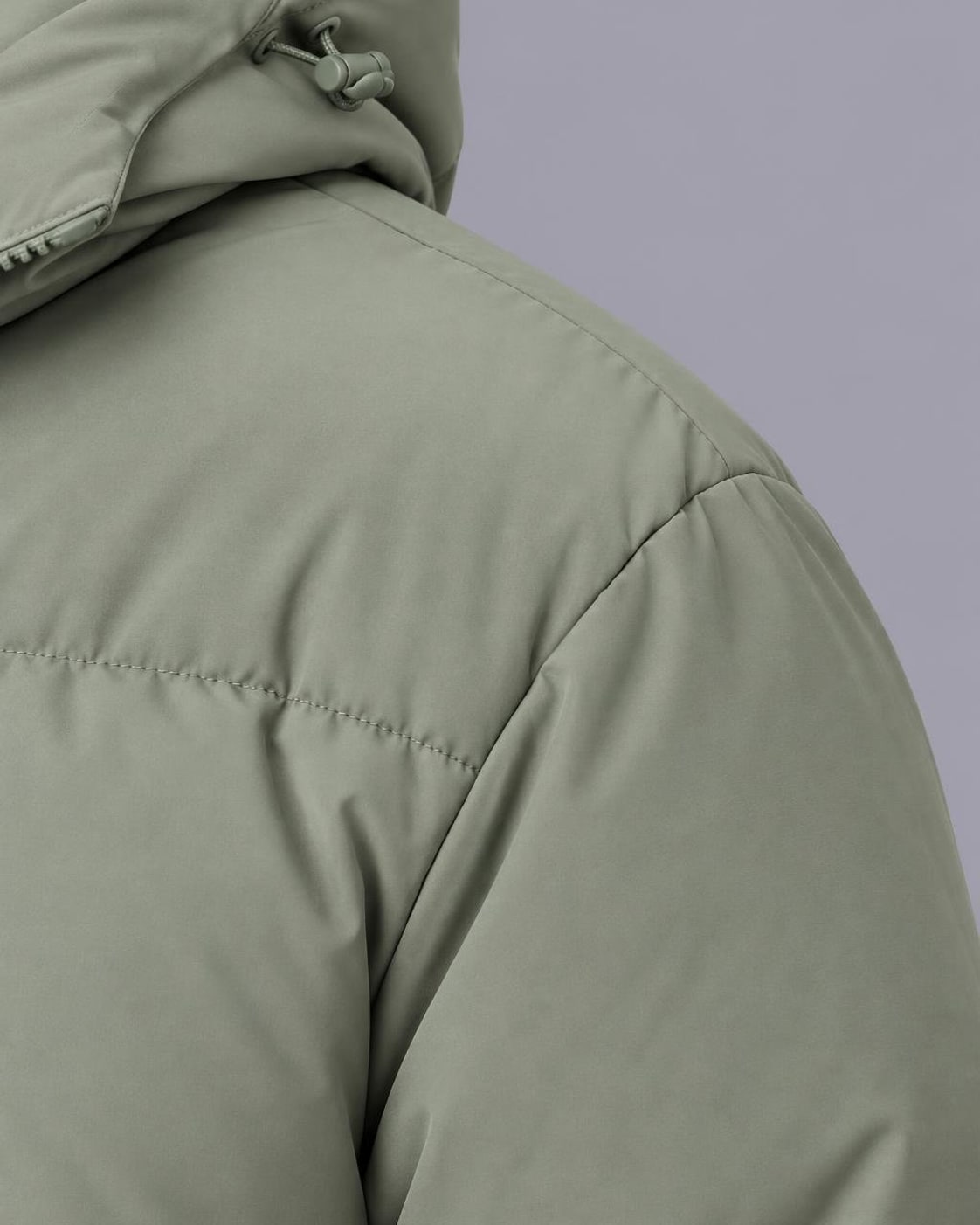 Men's Quilted Puffer Jacket – High Neck, Drawstring Hood – Sage Green – shoulder detail